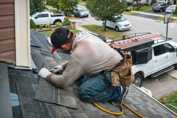 Professional Roofing technician working in Ontario Center, NY